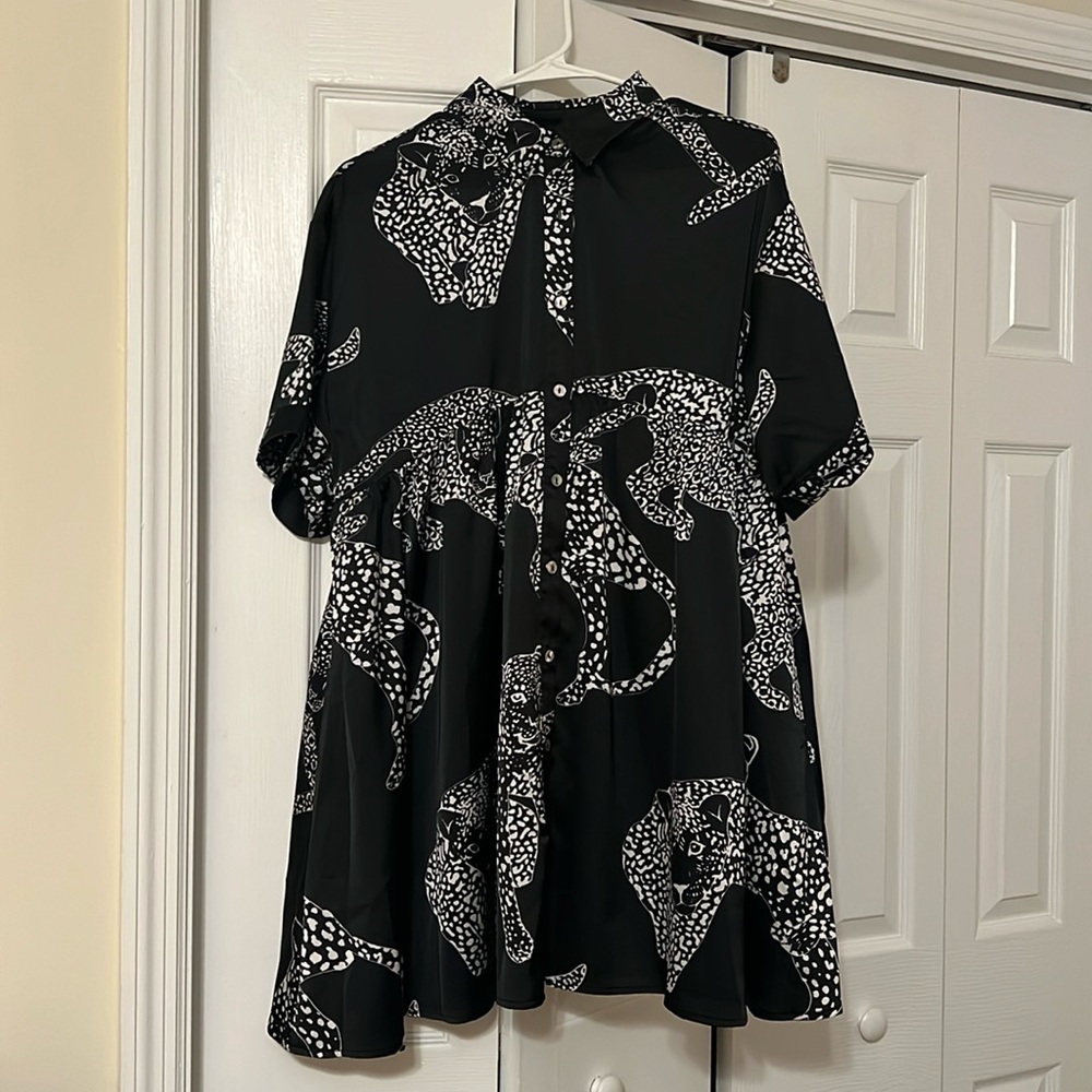 Beautiful print mini dress!  Size small.  Black and white satin material.